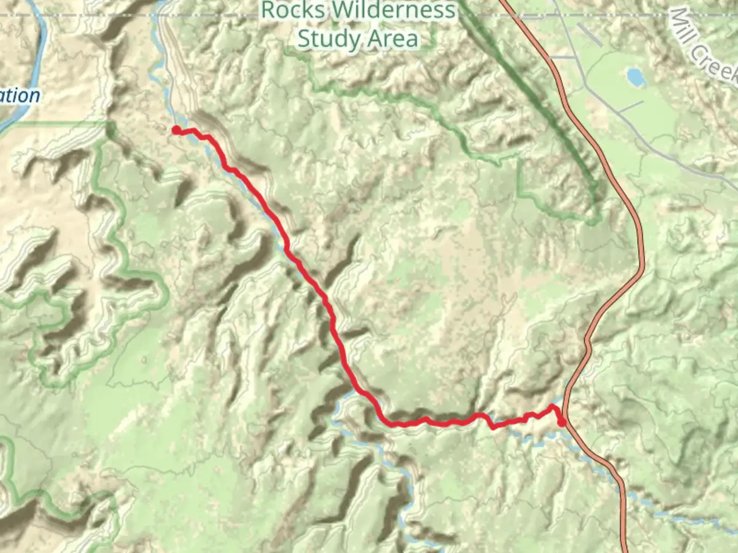 An image depicting the trail Kane Creek Canyon Trail and its surrounding area.
