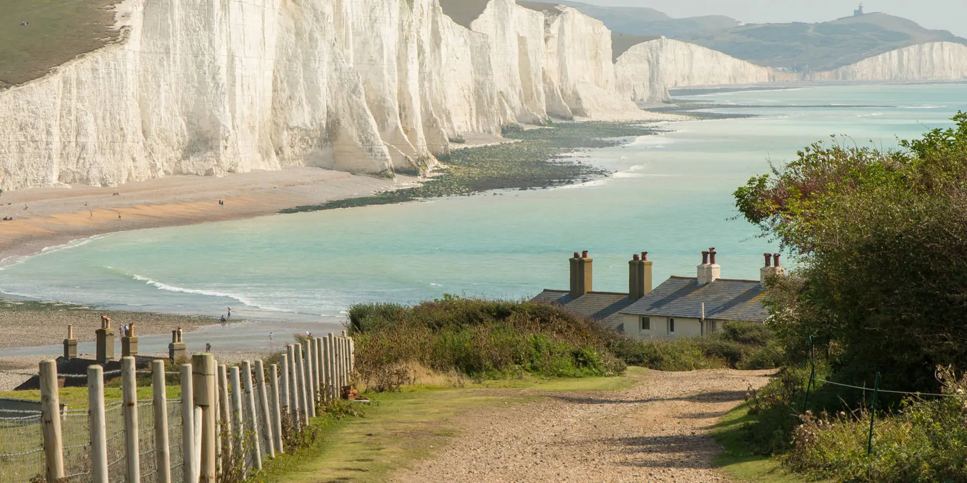 An image depicting the trail Beachy Head and Eastbourne from East Dean and its surrounding area.