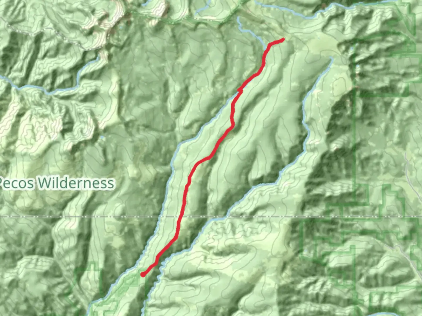 An image depicting the trail Hamilton Mesa and Pecos River Trail and its surrounding area.