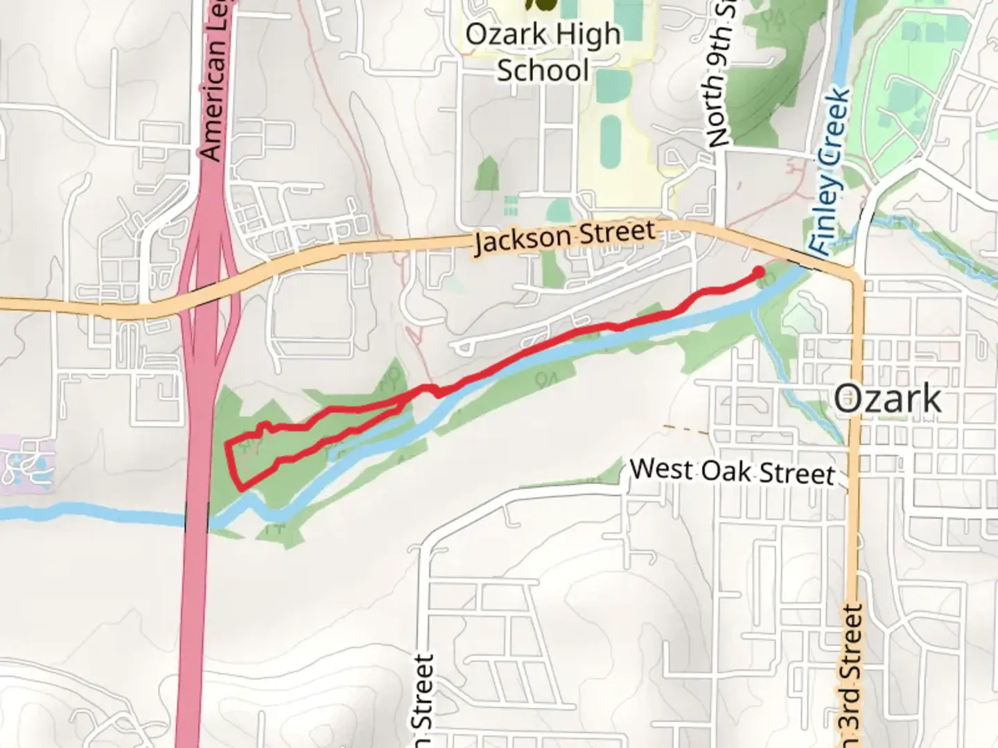 An image depicting the trail Ozark Finley River Greenway Trail and its surrounding area.