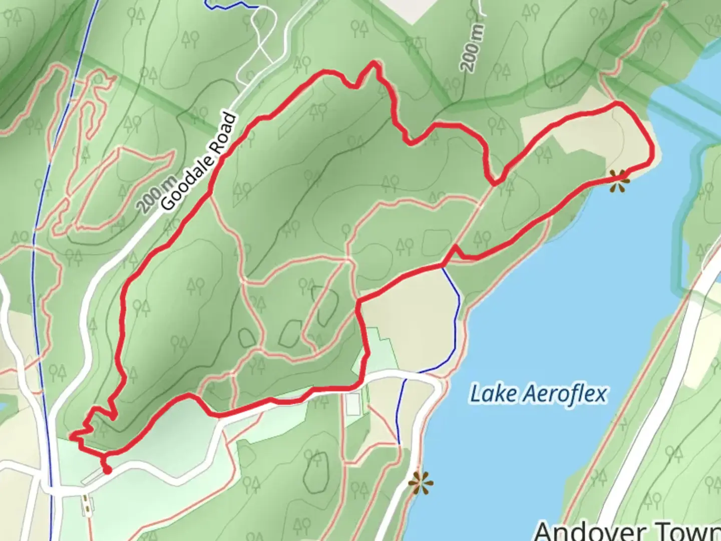 An image depicting the trail Loop beside Lake Aeroflex - West and its surrounding area.