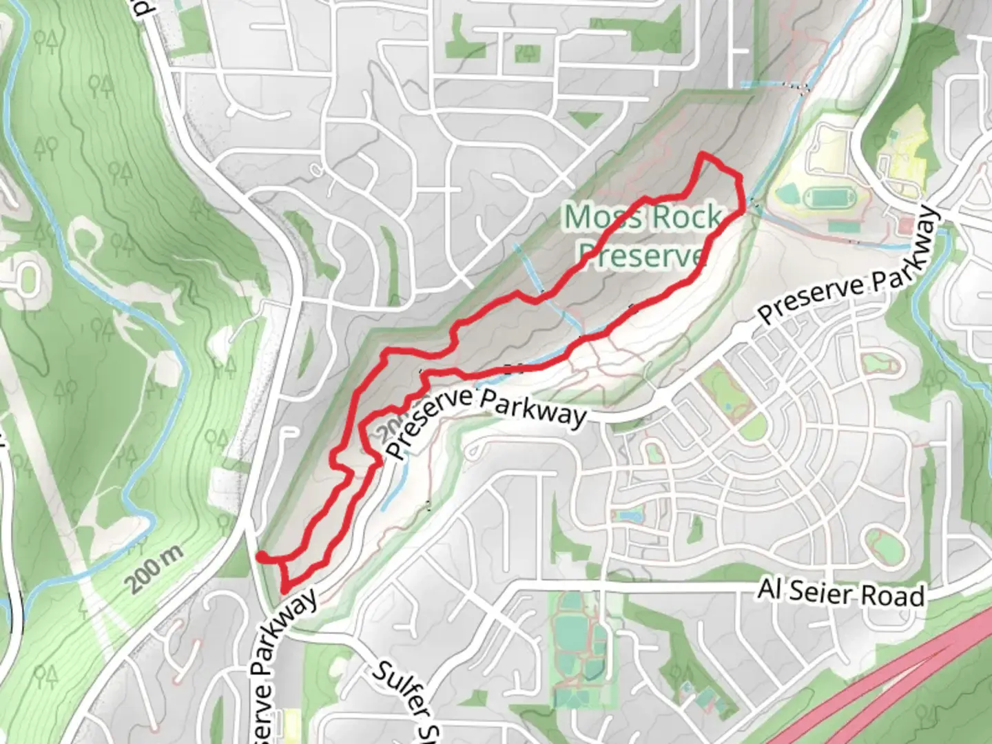 An image depicting the trail Moss Rock Preserve Blue-White Loop Trail and its surrounding area.