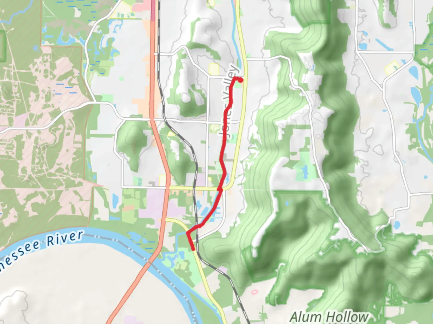 An image depicting the trail Aldridge Creek Greenway and its surrounding area.