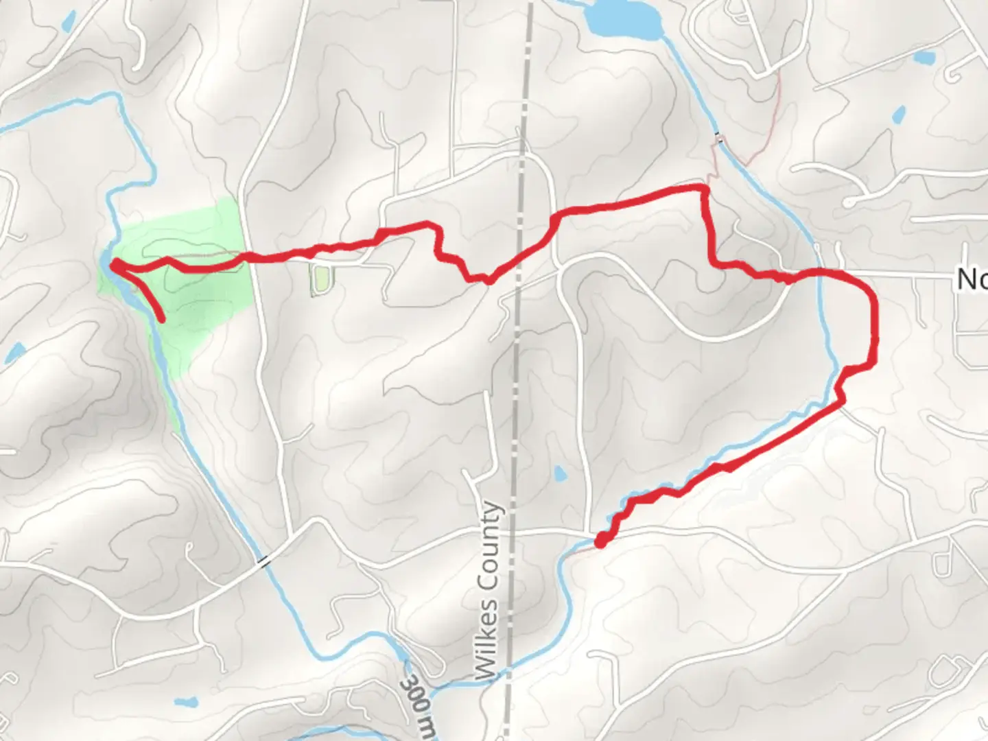 An image depicting the trail Carter Falls via Mountains-to-Sea Trail and its surrounding area.
