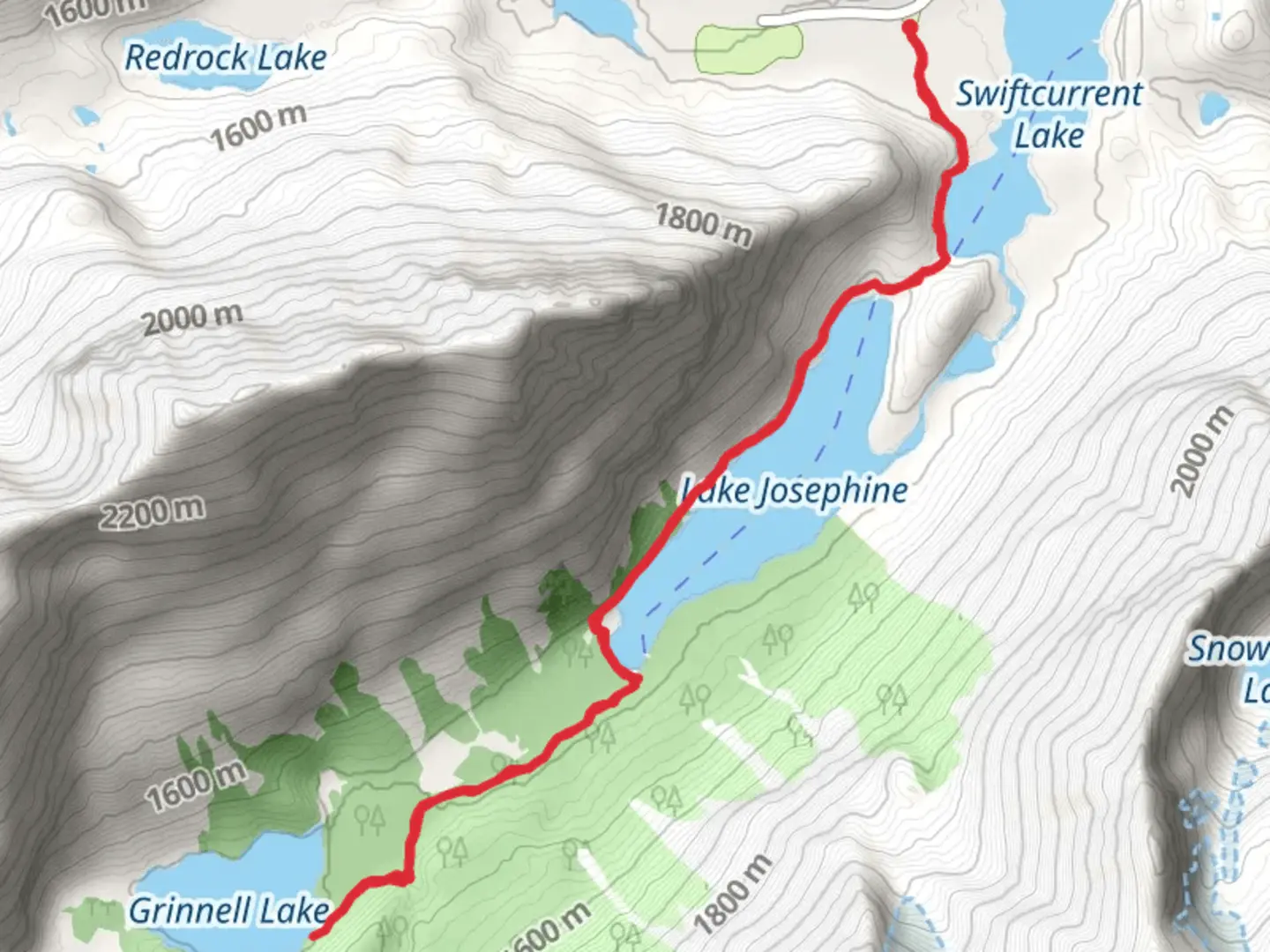 An image depicting the trail Grinnell Lake, Lake Josephine and Swiftcurrent Lake and its surrounding area.