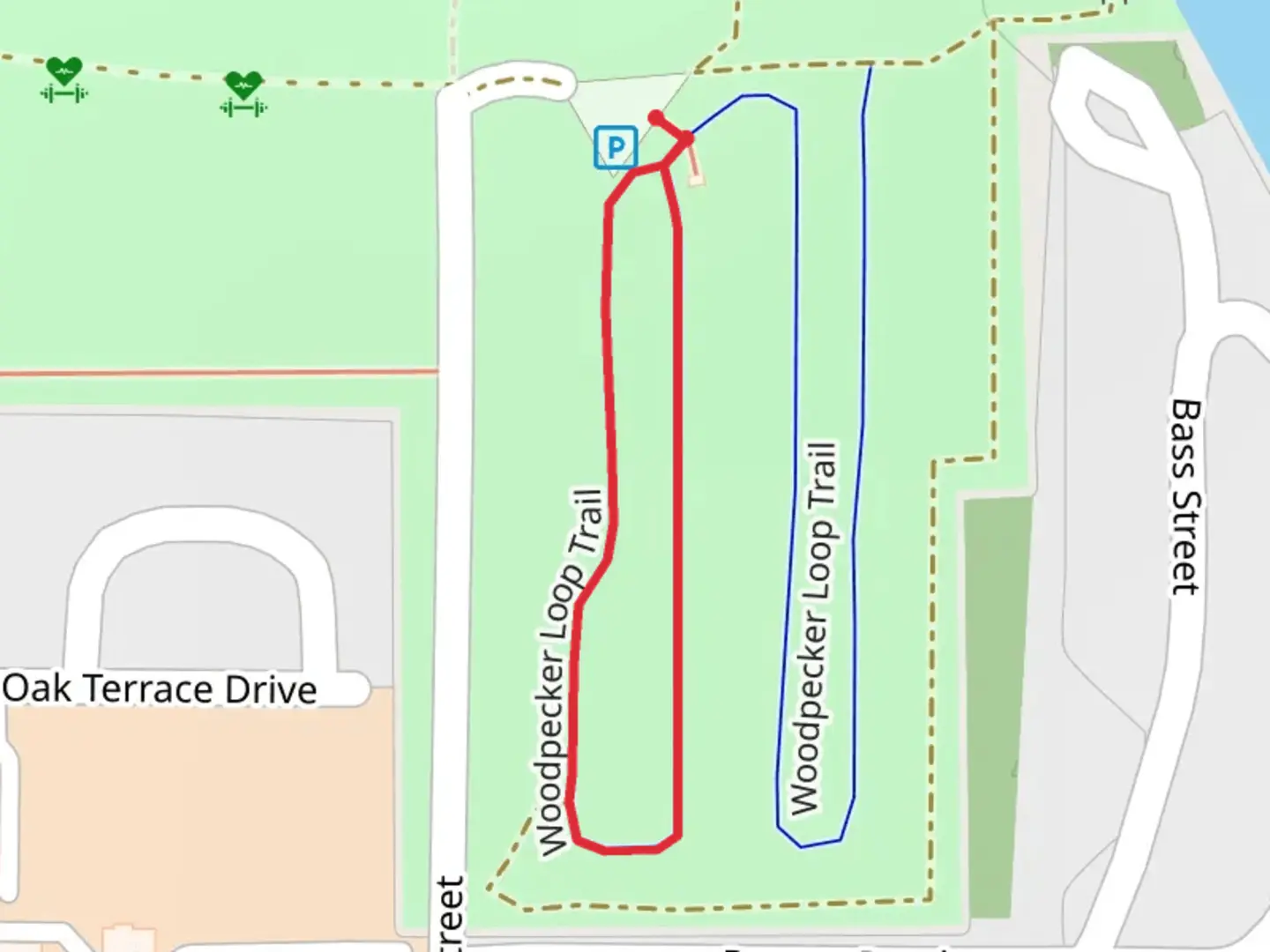 An image depicting the trail Woodpecker Short Loop Trail and its surrounding area.