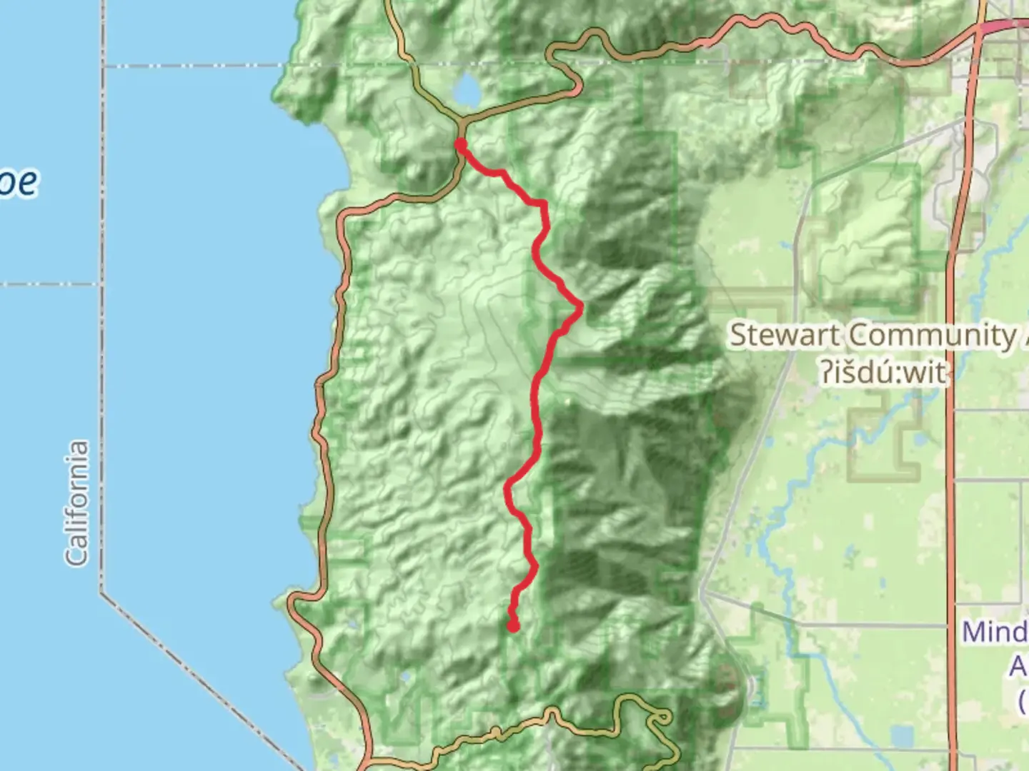 An image depicting the trail Genoa Peak Road and its surrounding area.