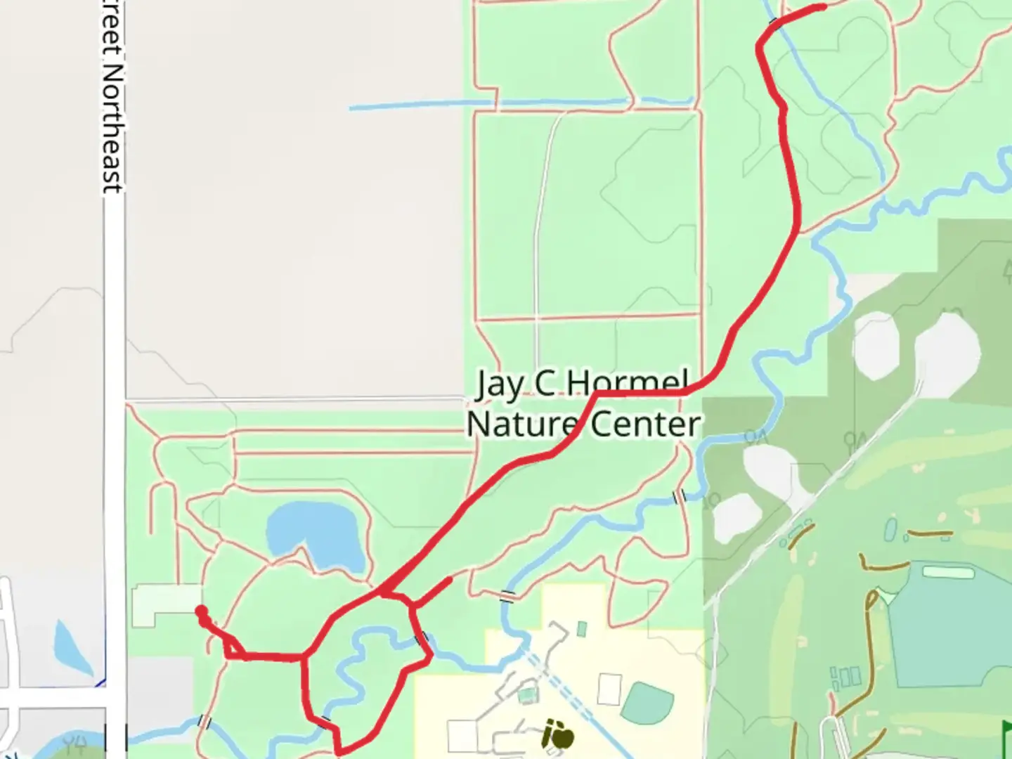 An image depicting the trail Restored Prairie Loop and Covered Bridge Trail and its surrounding area.