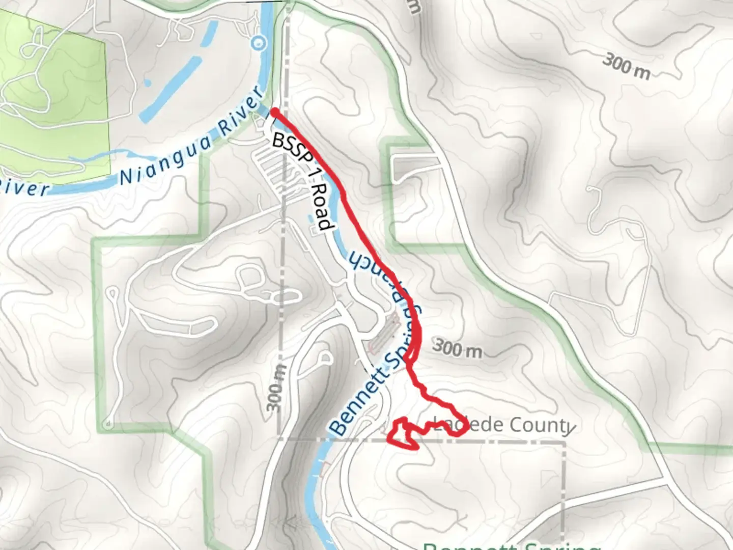 An image depicting the trail Whistle Trail, Oak-Hickory Trail and Bridge Trail and its surrounding area.