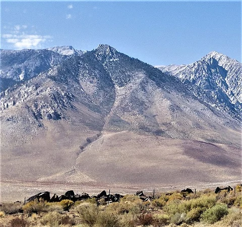 An image depicting the trail Sawmill Pass Trail and its surrounding area.