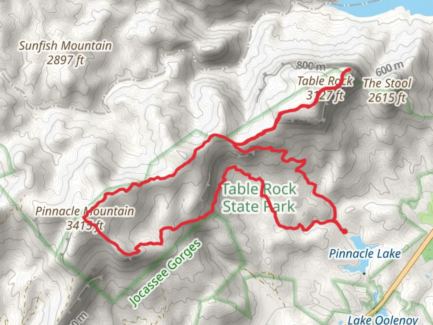 An image depicting the trail Table Rock, Pinnacle Mountain and Foothills Loop Trail and its surrounding area.