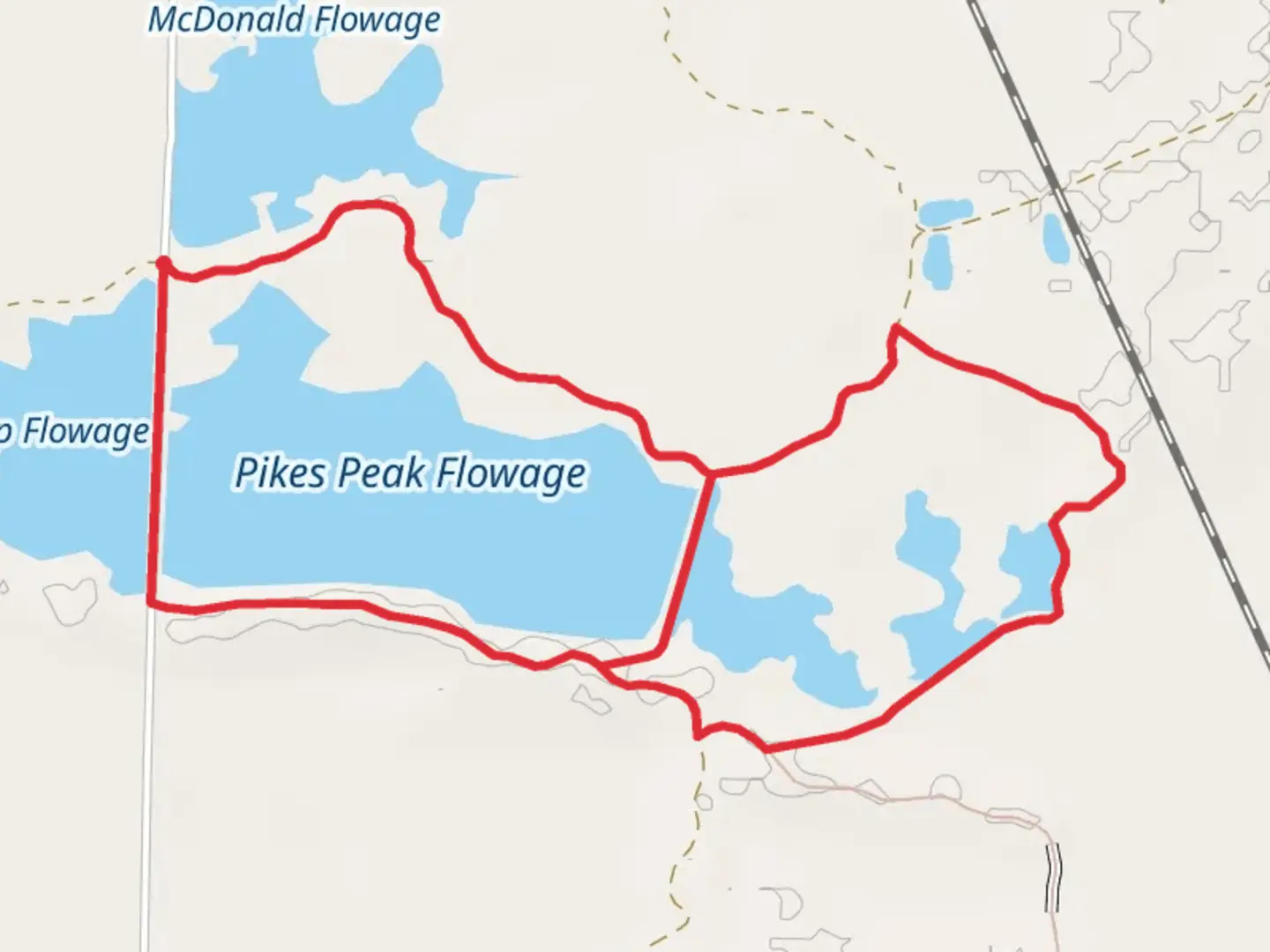 An image depicting the trail Pikes Peak Flowage Loop and its surrounding area.