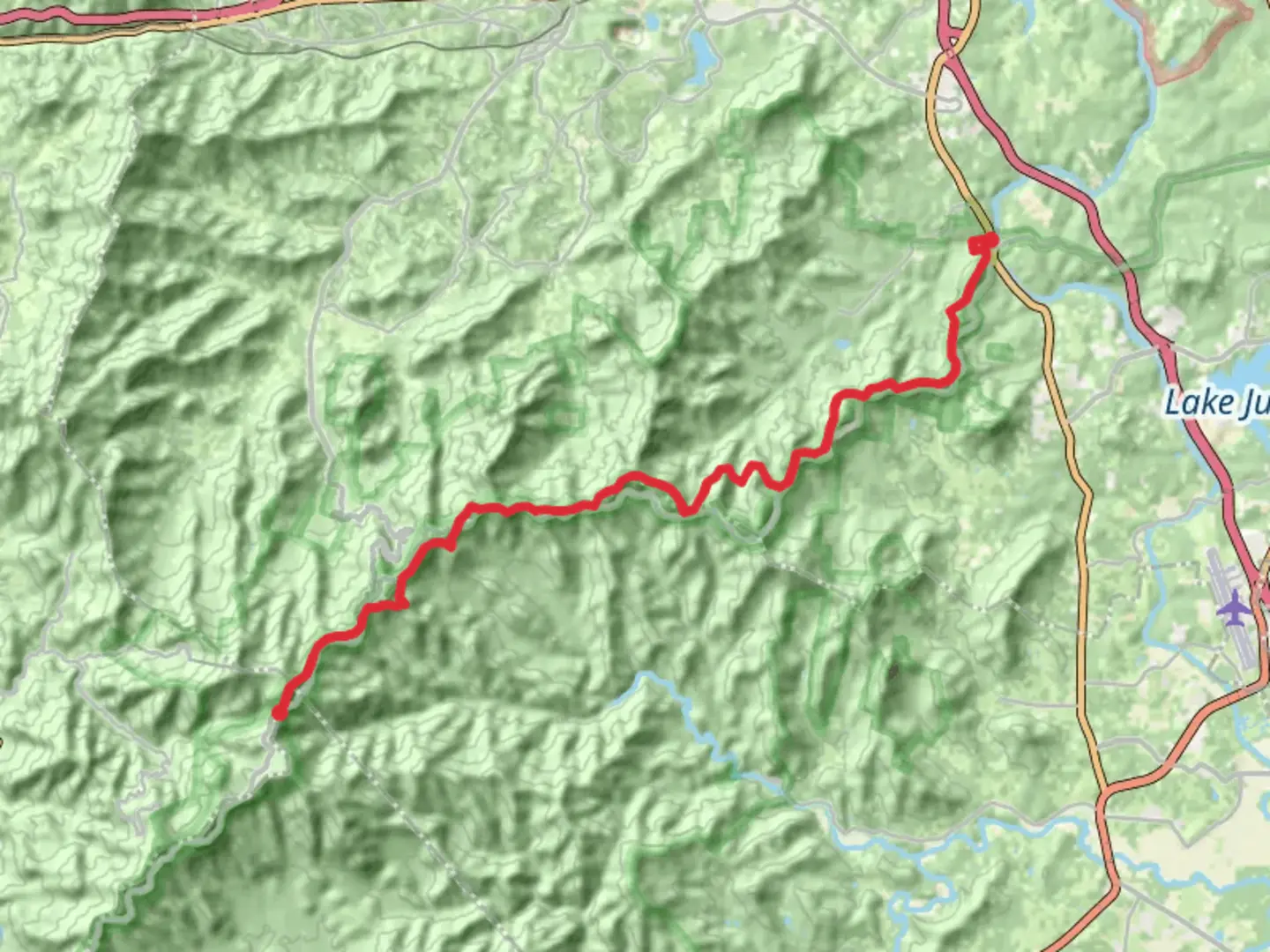 An image depicting the trail Shut-In Trail from Bent Creek River Park and its surrounding area.