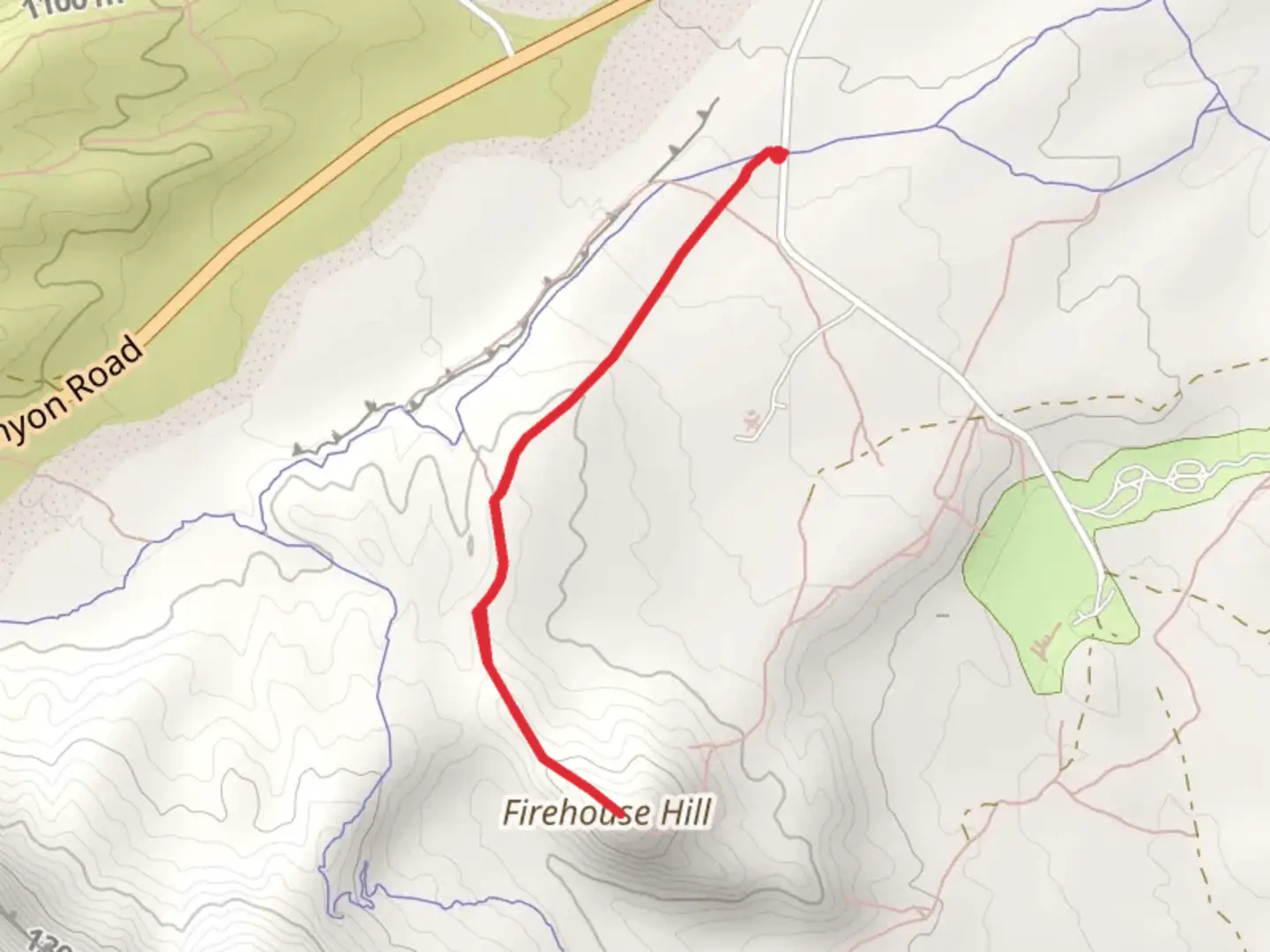 An image depicting the trail Firehouse Hill and its surrounding area.