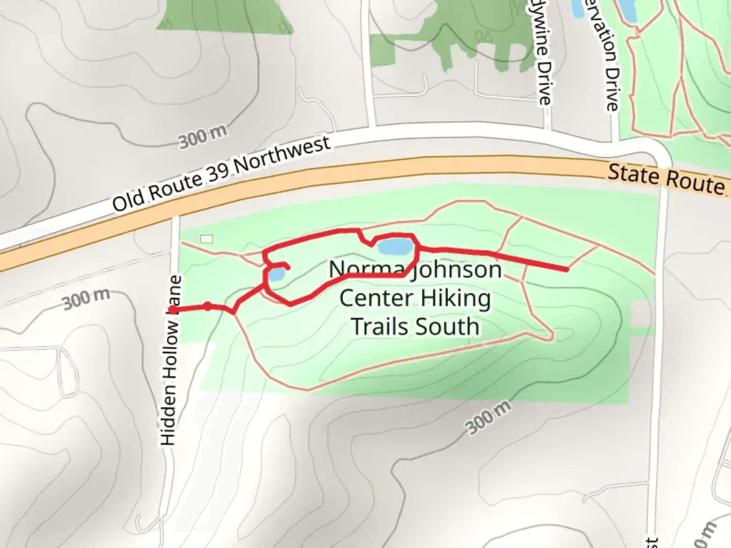 An image depicting the trail Hidden Hollow Lane Loop and its surrounding area.