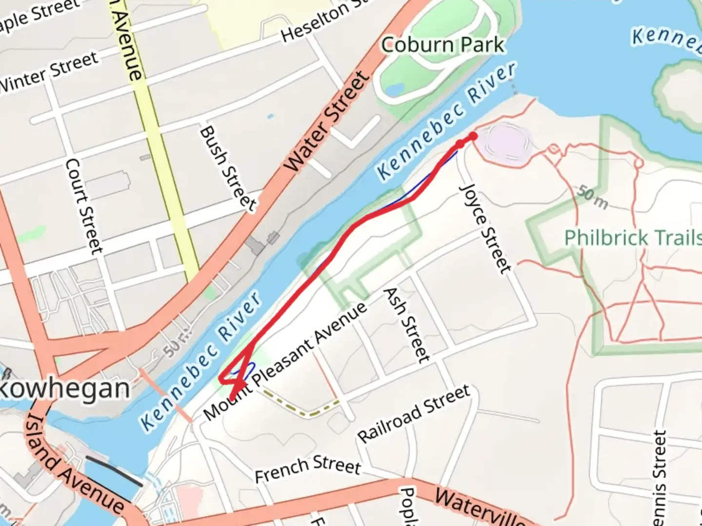 An image depicting the trail Skowhegan Riverwalk and its surrounding area.