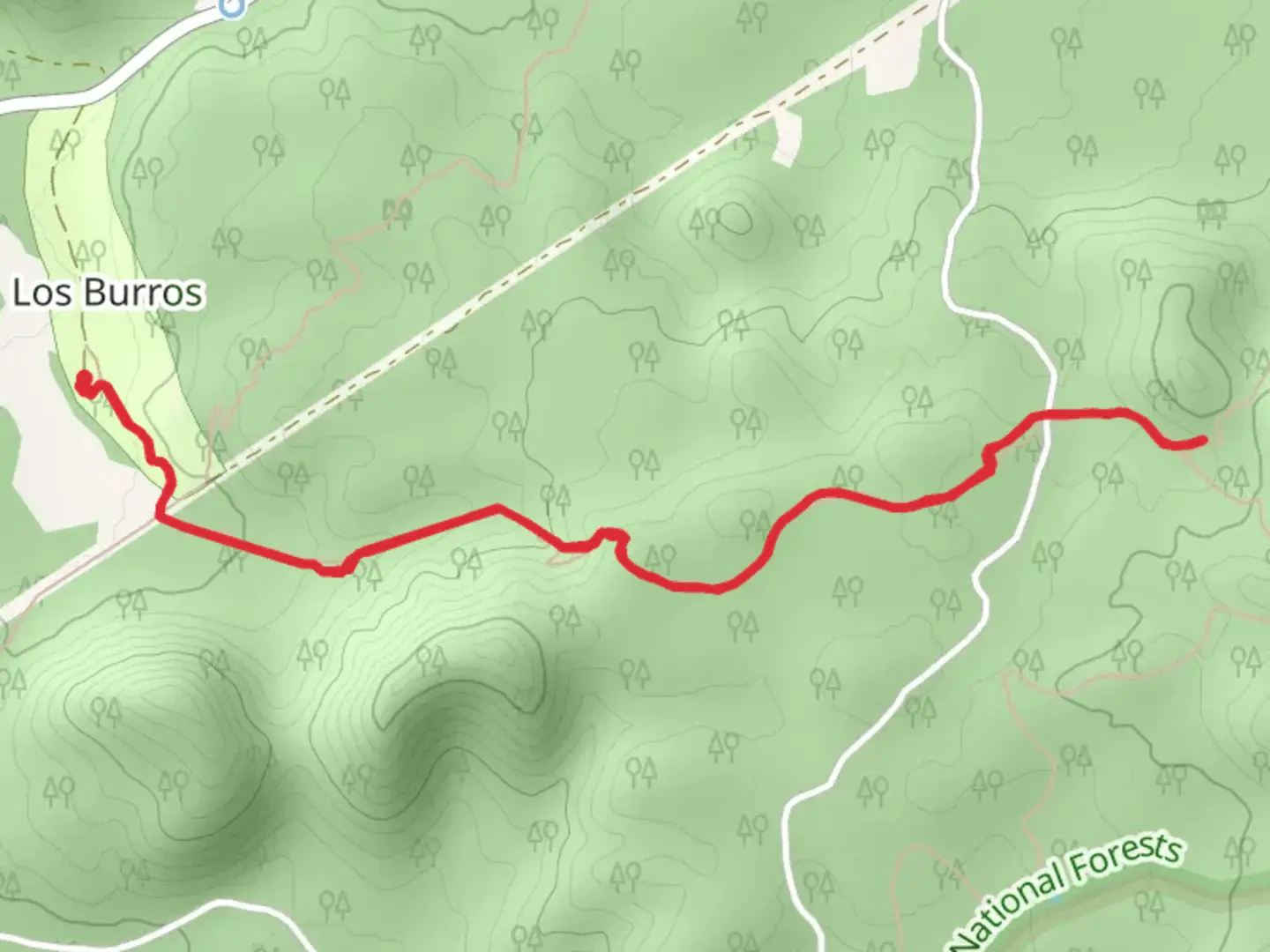 An image depicting the trail Los Burros Shortcut Trail via Los Burros Trail and its surrounding area.