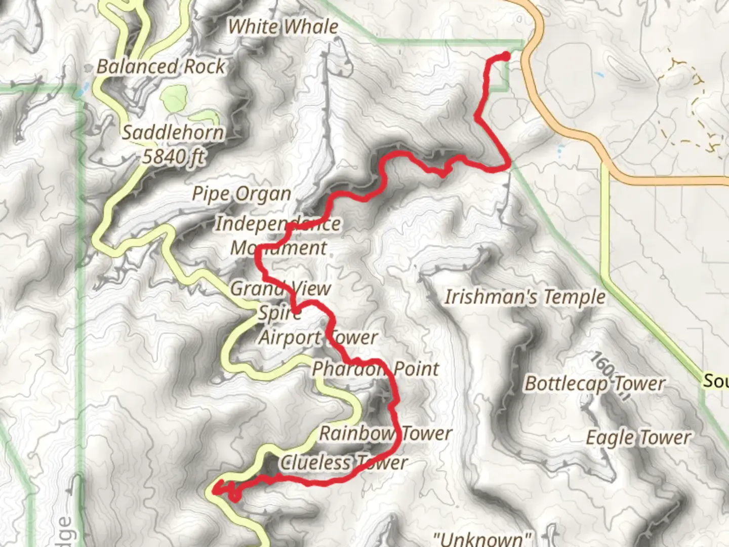 An image depicting the trail Monolith Spire and Independence Monument via Monument Canyon Trail and its surrounding area.