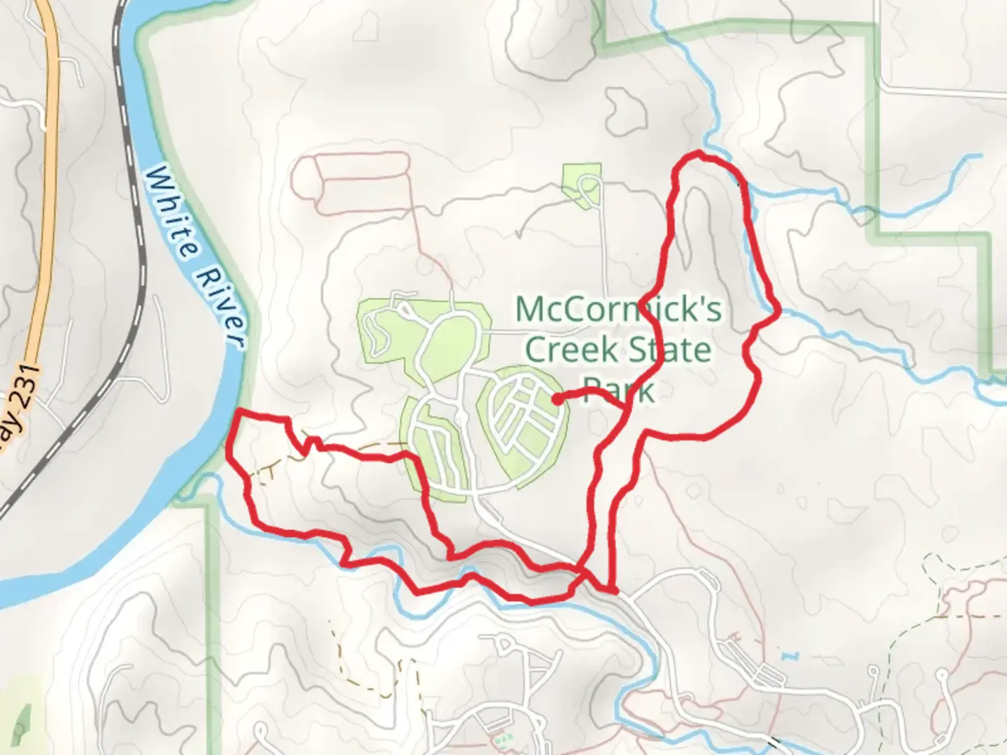 An image depicting the trail McCormick's Creek Waterfall Loop and its surrounding area.
