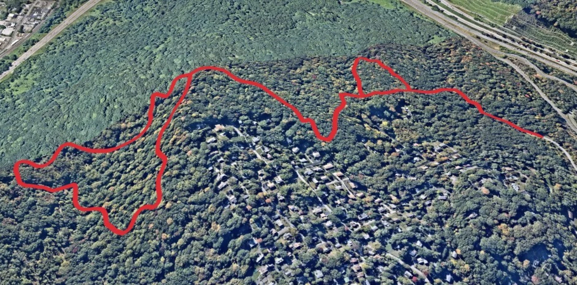 An image depicting the trail Blue Trail Loop from Graham Hills County Park Entranceway and its surrounding area.