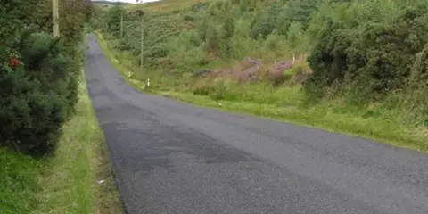 An image depicting the trail Moydamlaght Forest - Short Trail and its surrounding area.