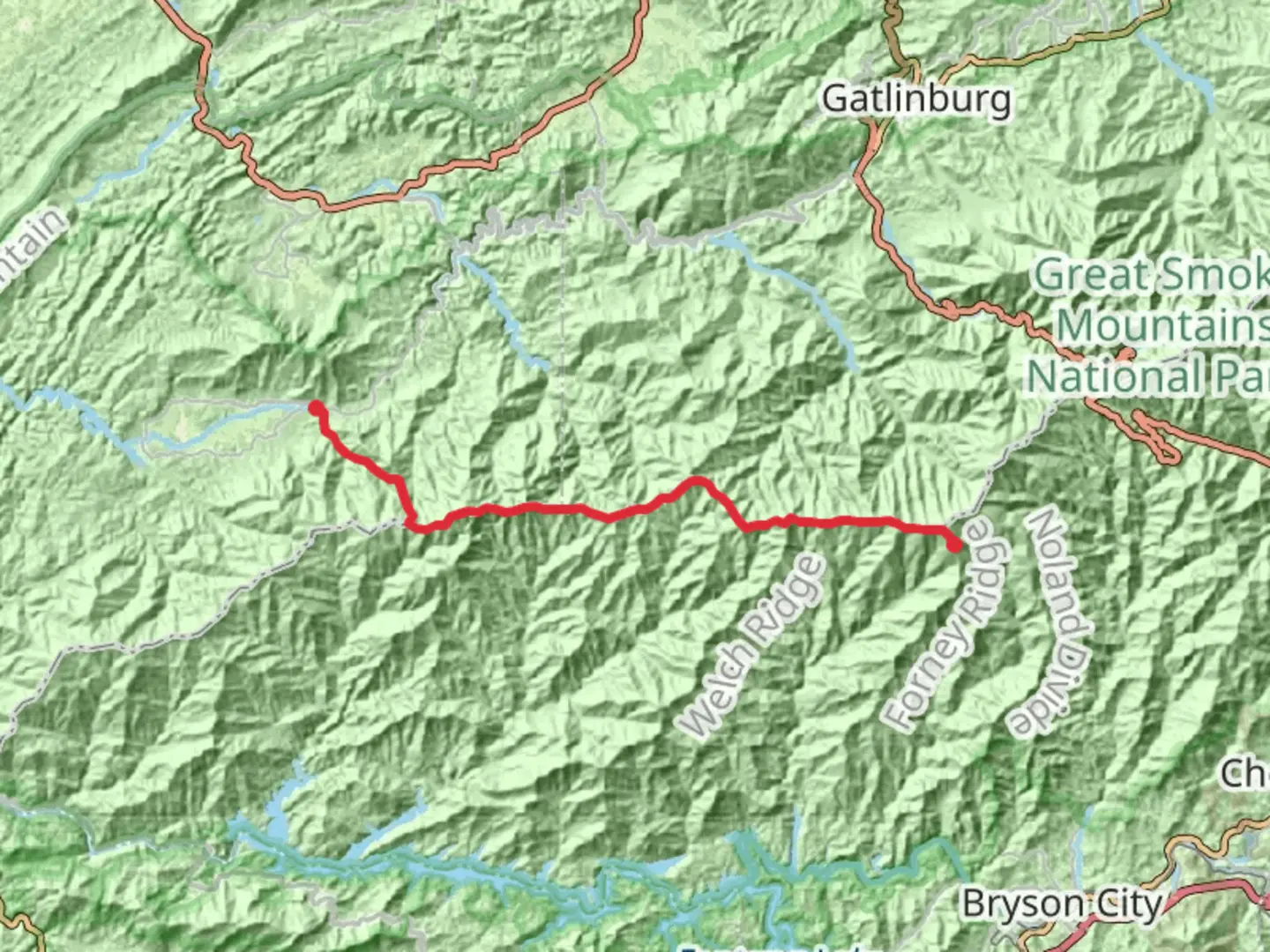 An image depicting the trail Clingmans Dome to Cades Cove via Appalachian Trail and its surrounding area.