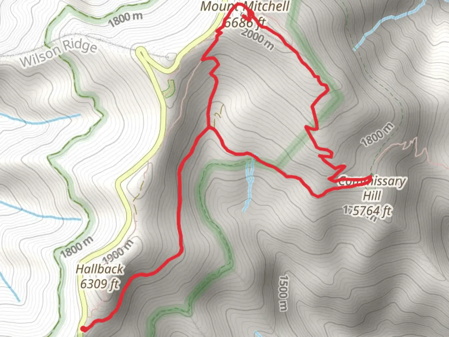 An image depicting the trail Commissary Hill and Mount Mitchell Loop Trail and its surrounding area.