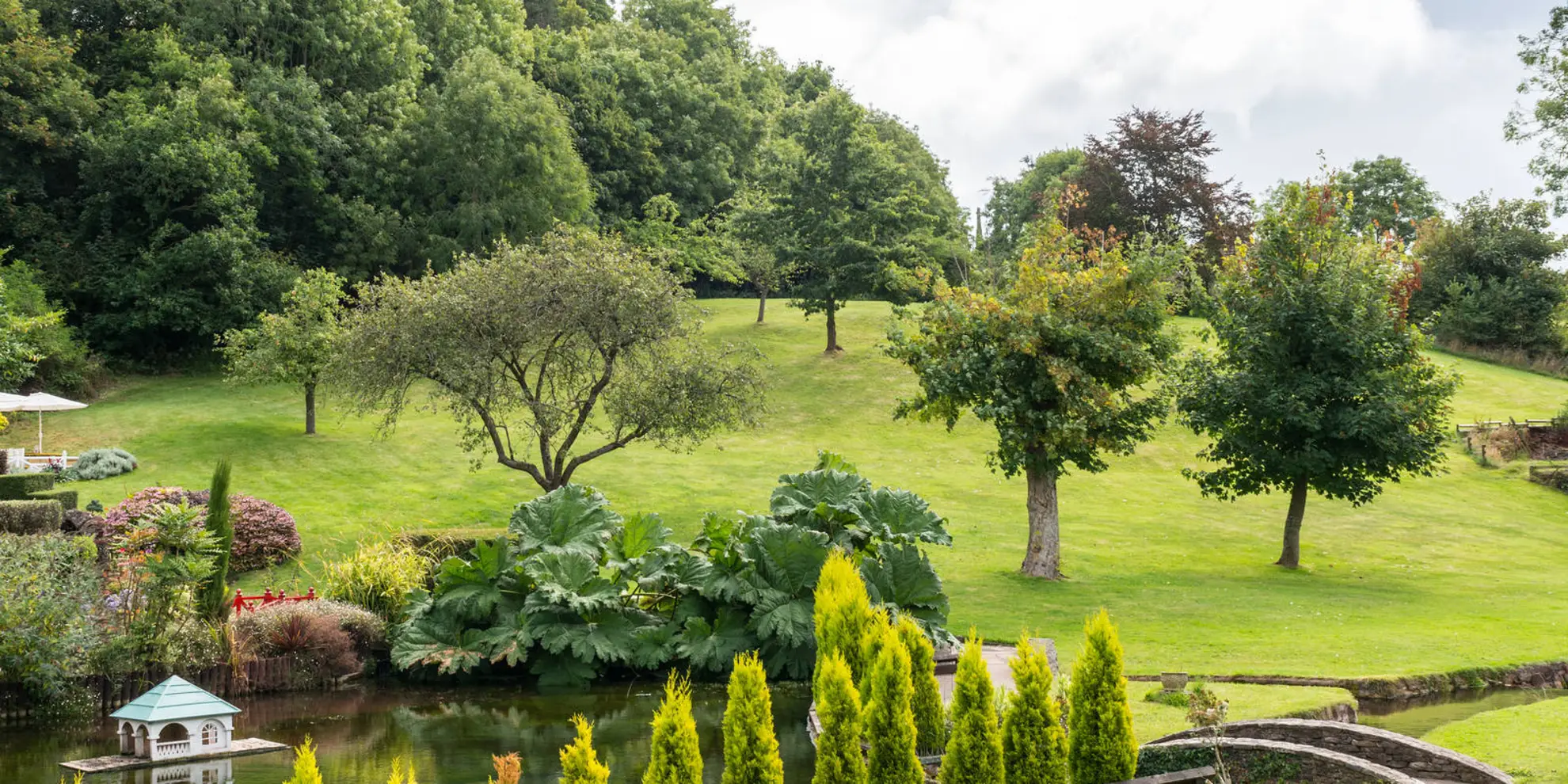 An image depicting the trail Bay Tor Park Hotel - Cockington Walk and its surrounding area.