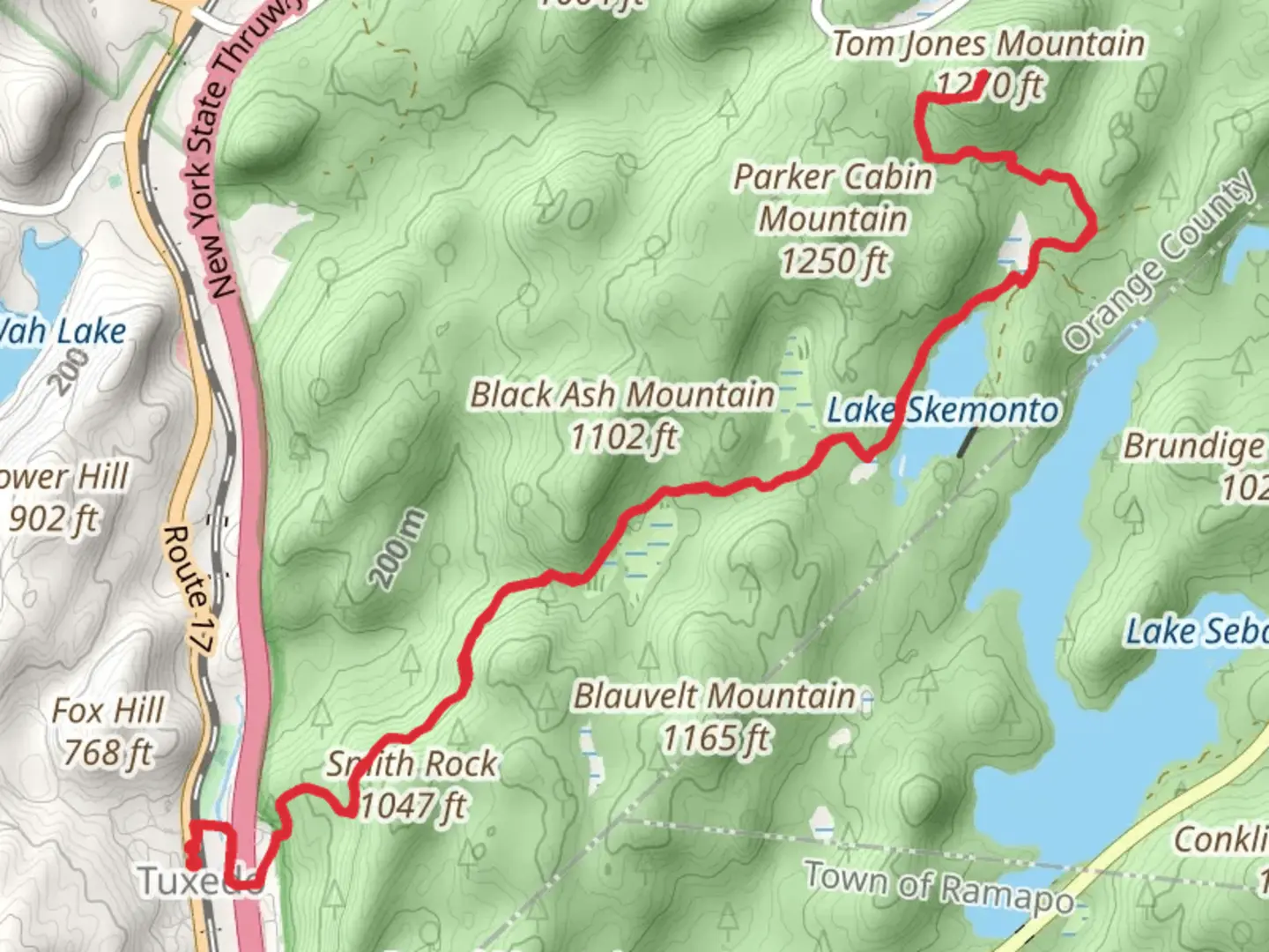An image depicting the trail Tom Jones Mountain Trail via Tuxedo and its surrounding area.