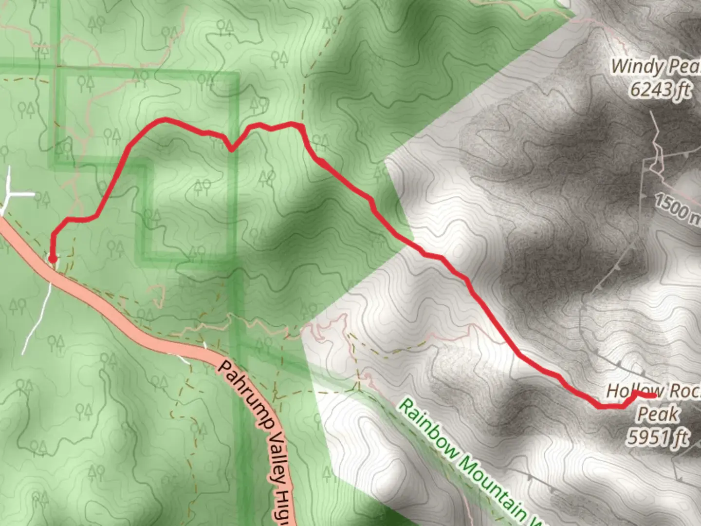 An image depicting the trail Hollow Rock Peak from Pahrump Valley Highway and its surrounding area.