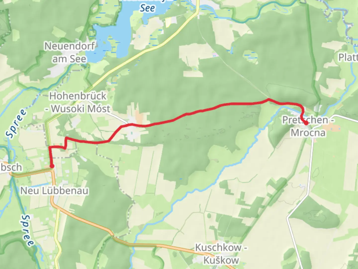 An image depicting the trail Neu Lübbenau to Pretschen Mrocna via Grosse Dorfstrasse and its surrounding area.