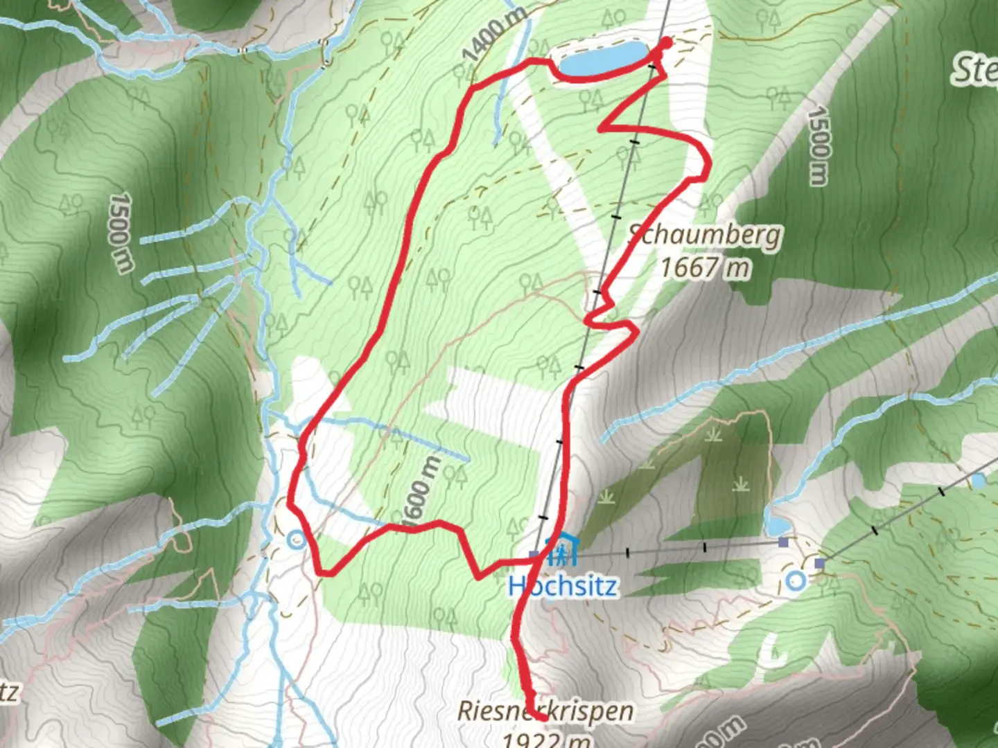 An image depicting the trail Riesnerkrispen Peak and its surrounding area.