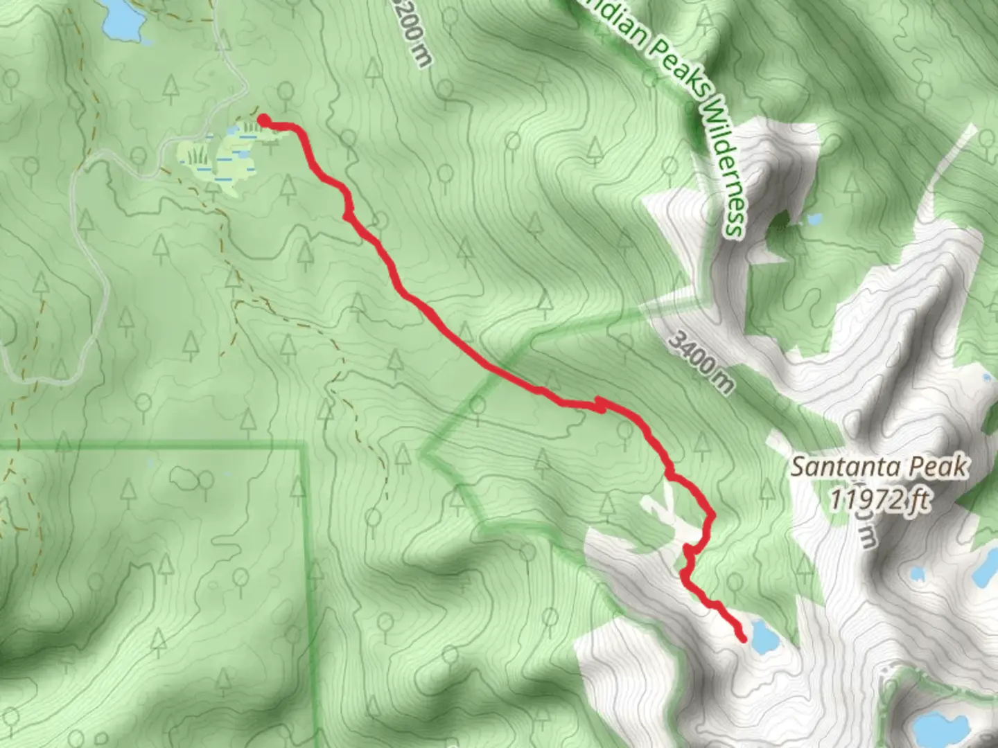 An image depicting the trail Columbine Lake via Caribou Pass Trail and its surrounding area.