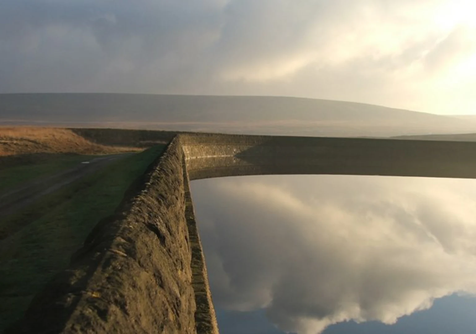 An image depicting the trail Blackstone Edge and Green Withens Reservoir Loop and its surrounding area.