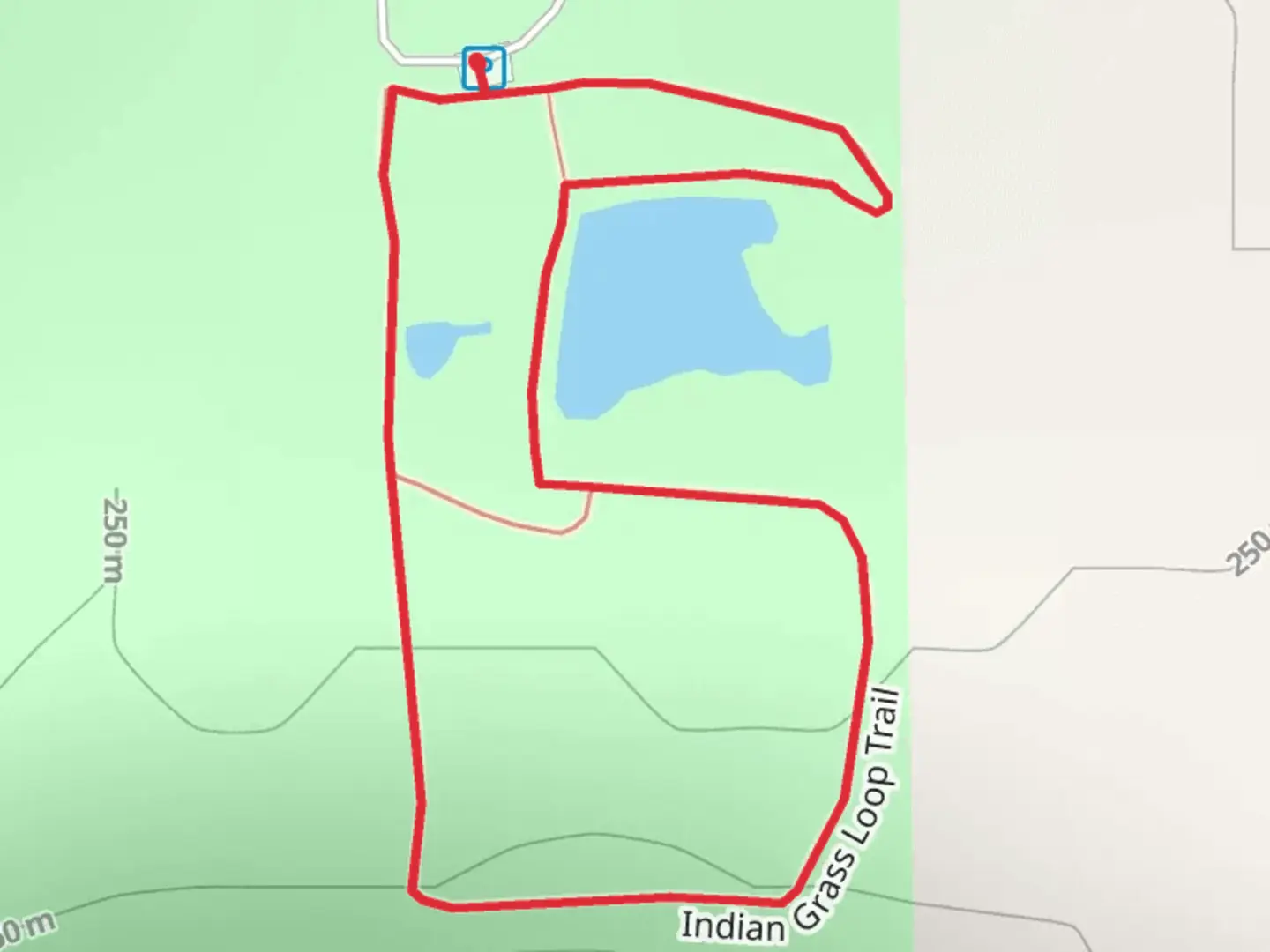 An image depicting the trail Indian Grass Trail and Orchard Loop Trai and its surrounding area.
