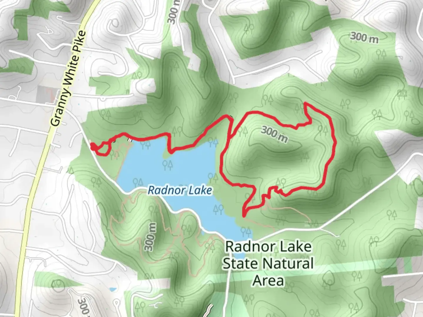 An image depicting the trail Radnor Lake - Ganier Ridge Loop Trail and its surrounding area.