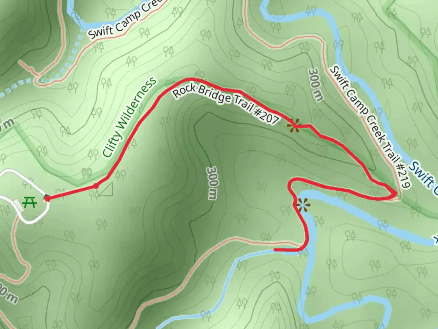 An image depicting the trail Rock Bridge Falls and its surrounding area.