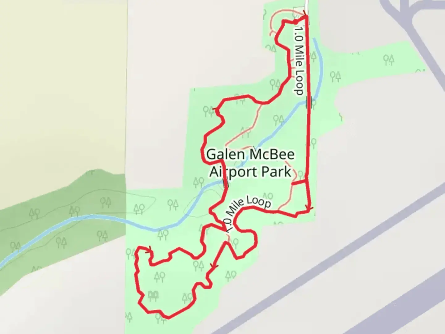 An image depicting the trail Galen McBee Airport Park Loop and its surrounding area.