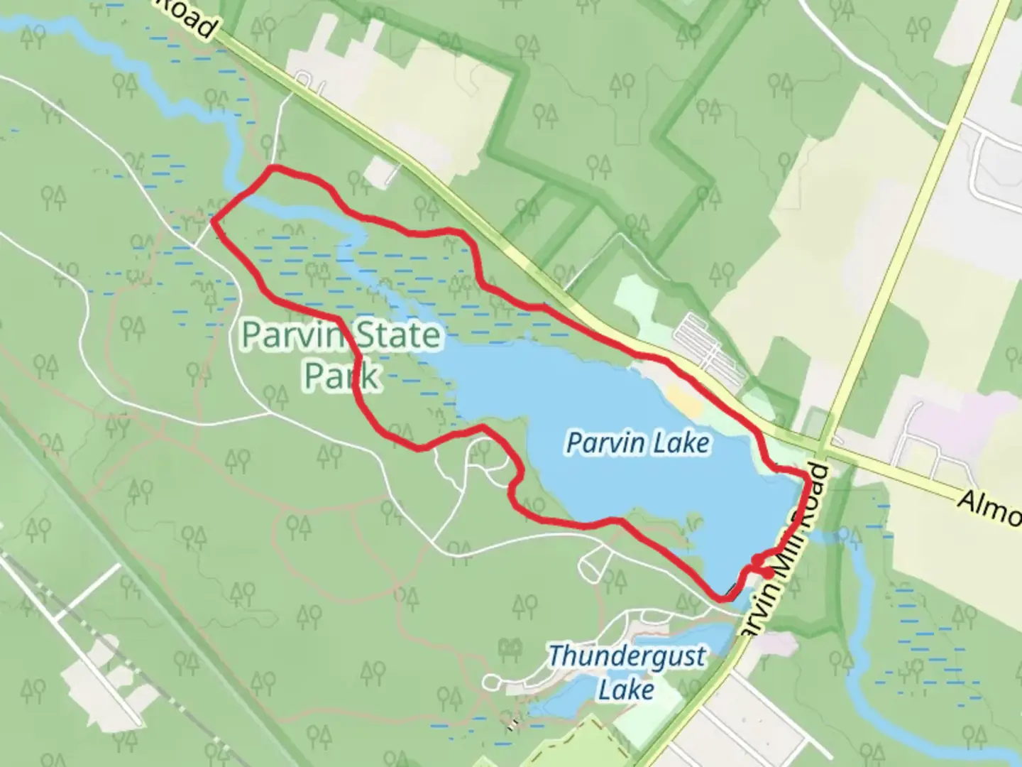 An image depicting the trail Parvin Lake Green Loop Trail and its surrounding area.