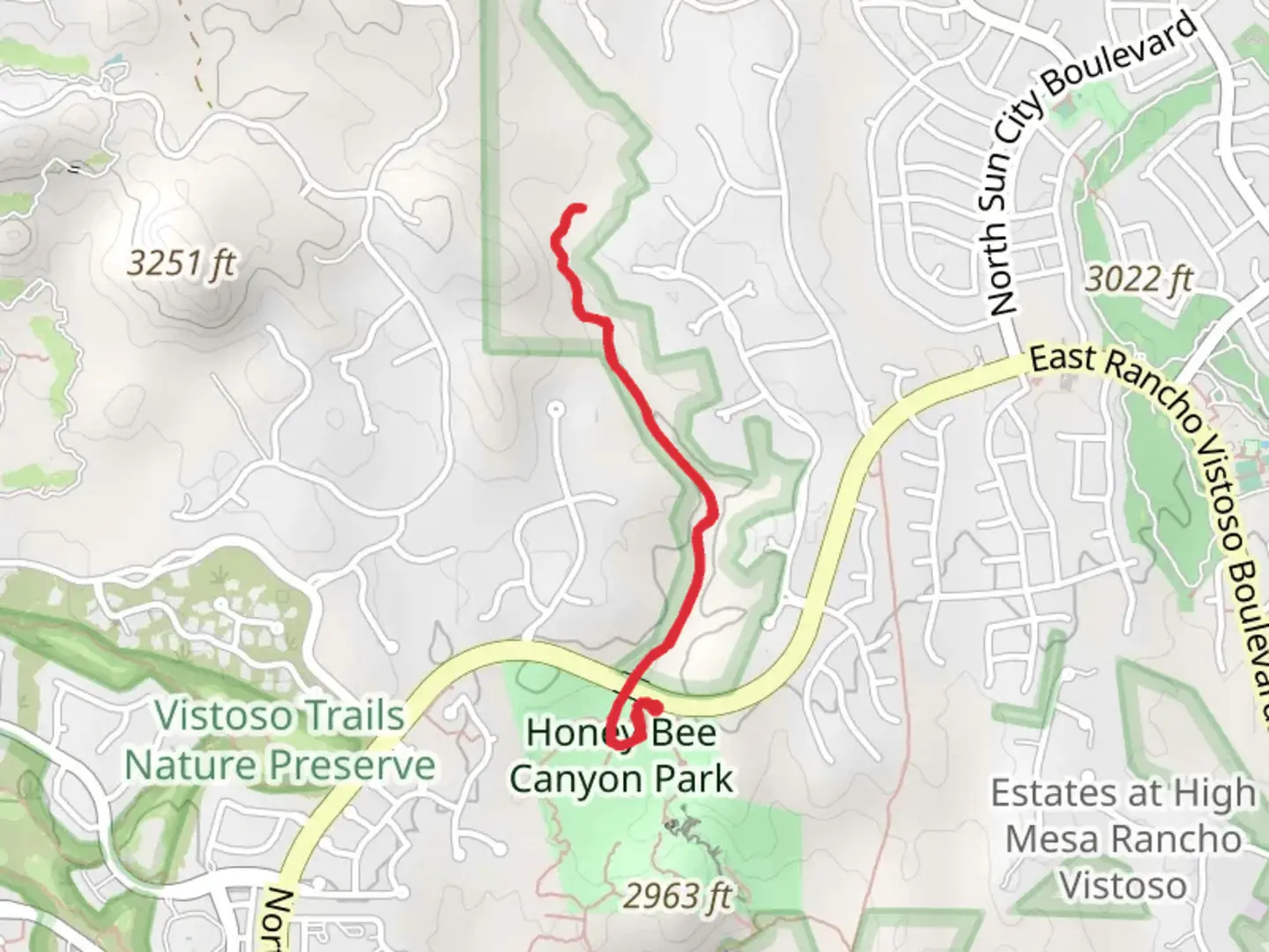 An image depicting the trail Petroglyphs Trail - Honey Bee Canyon Park and its surrounding area.