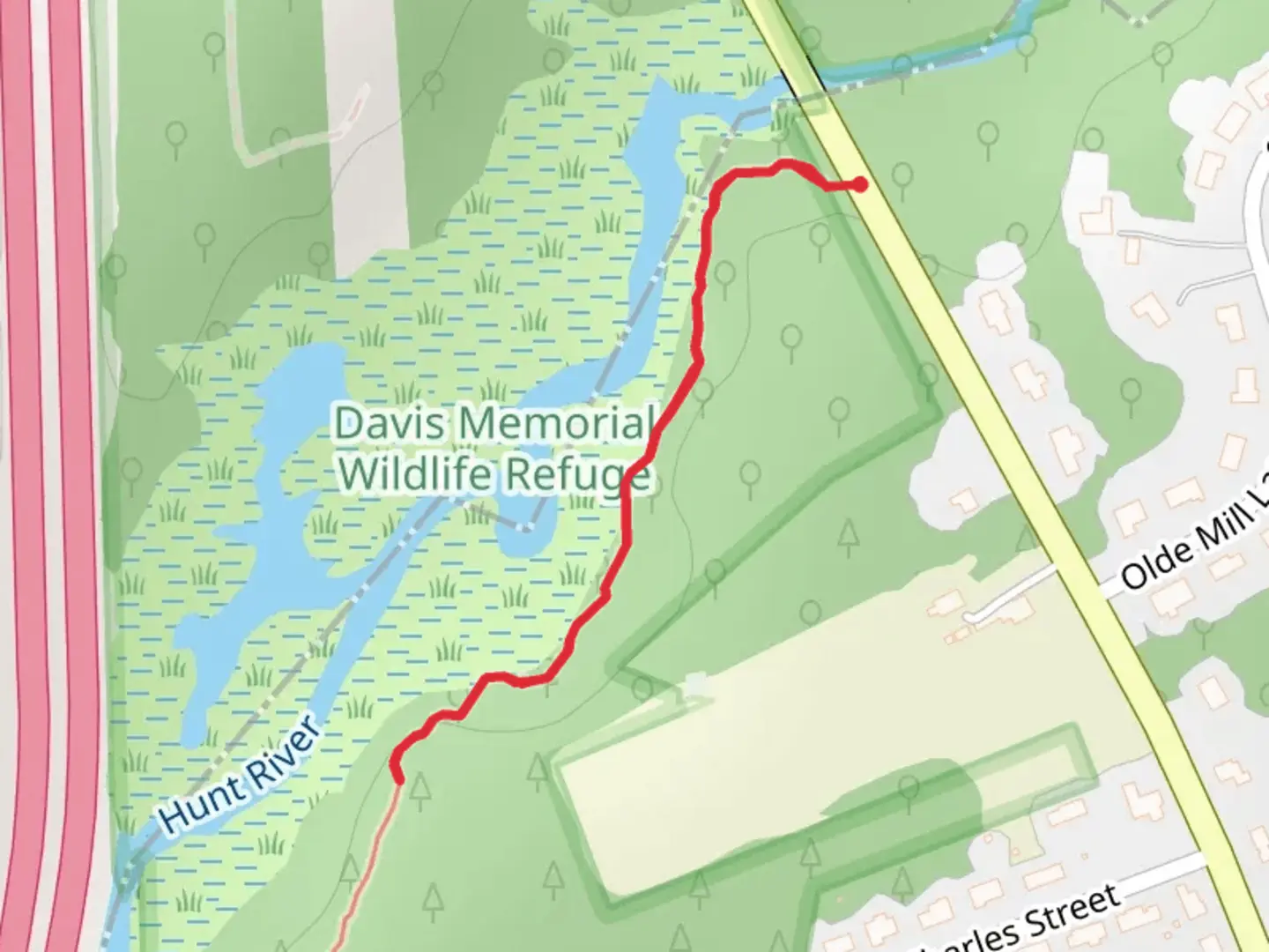 An image depicting the trail Walk along Hunt River and its surrounding area.