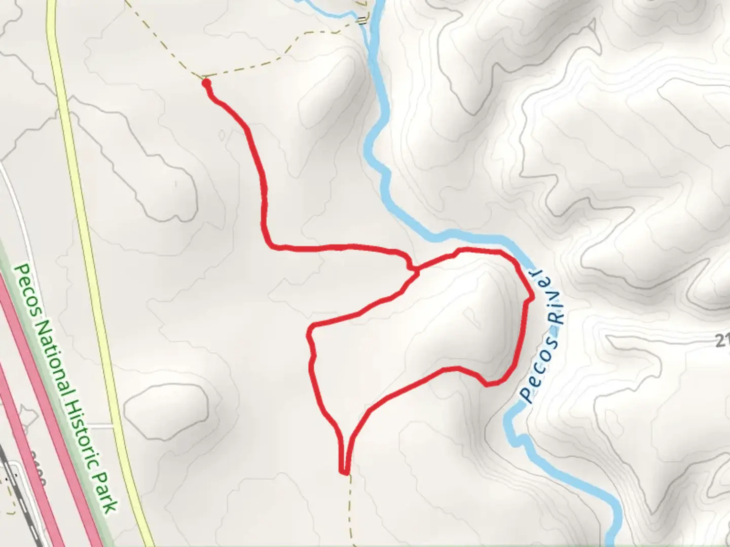 An image depicting the trail Loop beside Pecos River and its surrounding area.