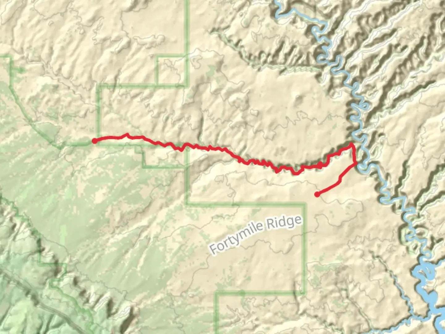 An image depicting the trail Coyote Gulch Red Well Route and its surrounding area.