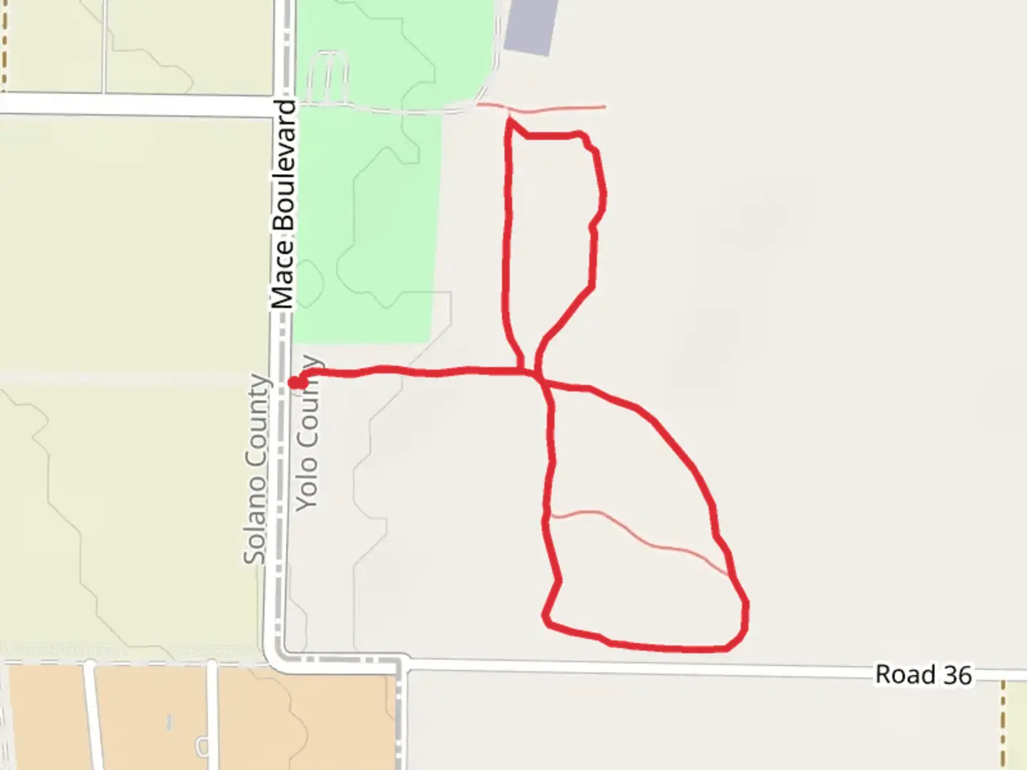 An image depicting the trail Mace Boulevard East Loop and its surrounding area.