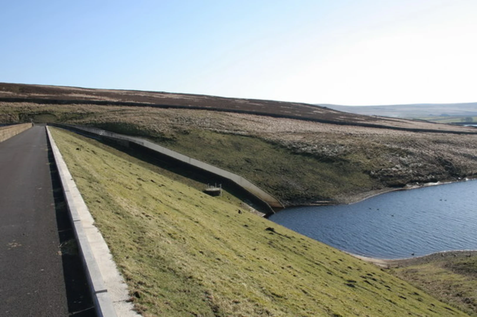 An image depicting the trail Hebden Water and Walshaw Dean Lower Reservoir and its surrounding area.