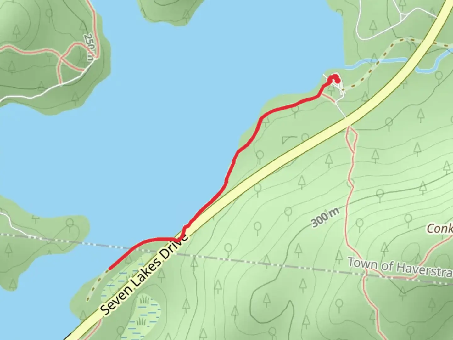 An image depicting the trail Lake Sebago South Shore Trail and its surrounding area.