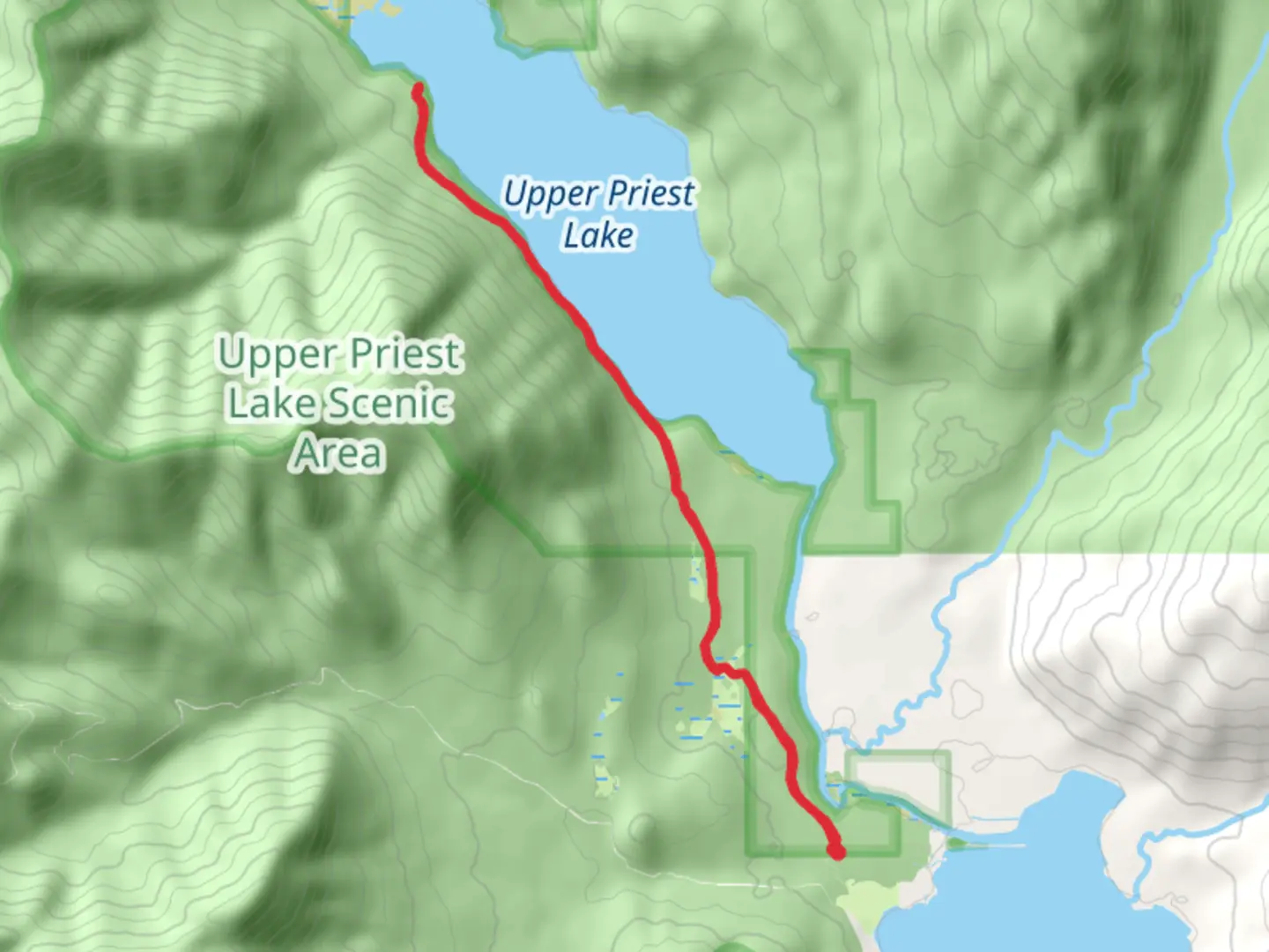 An image depicting the trail Upper Priest Lake via Navigation Trail and its surrounding area.
