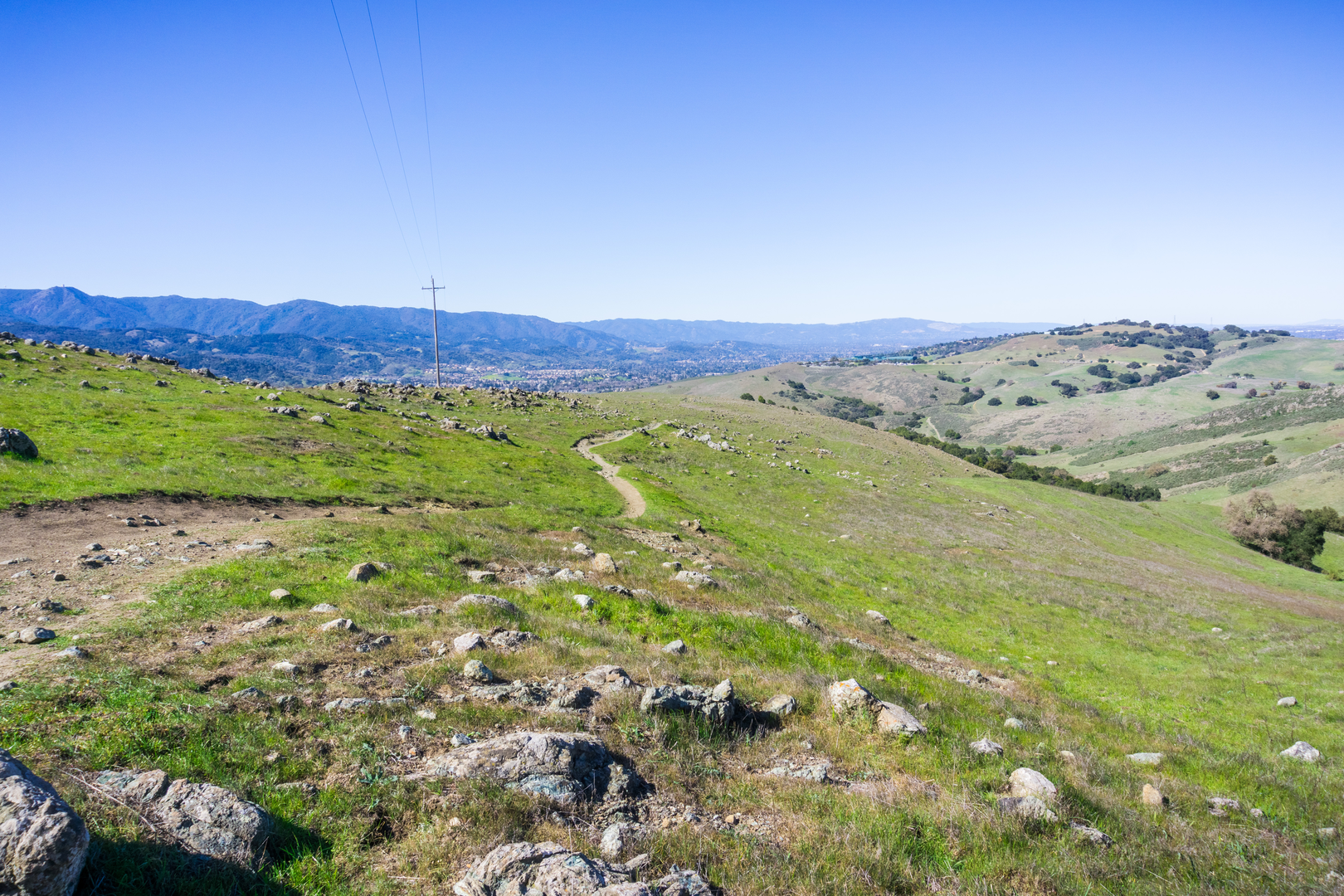 An image depicting the trail Stile Ranch and Fortini Trail Loop via Calero Creek Trail and its surrounding area.