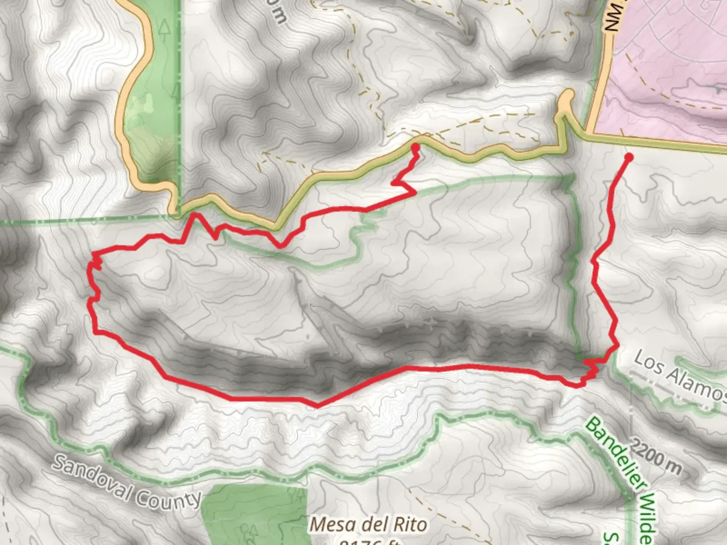 An image depicting the trail Upper Frijoles Crossings via Apache Spring Trail and its surrounding area.