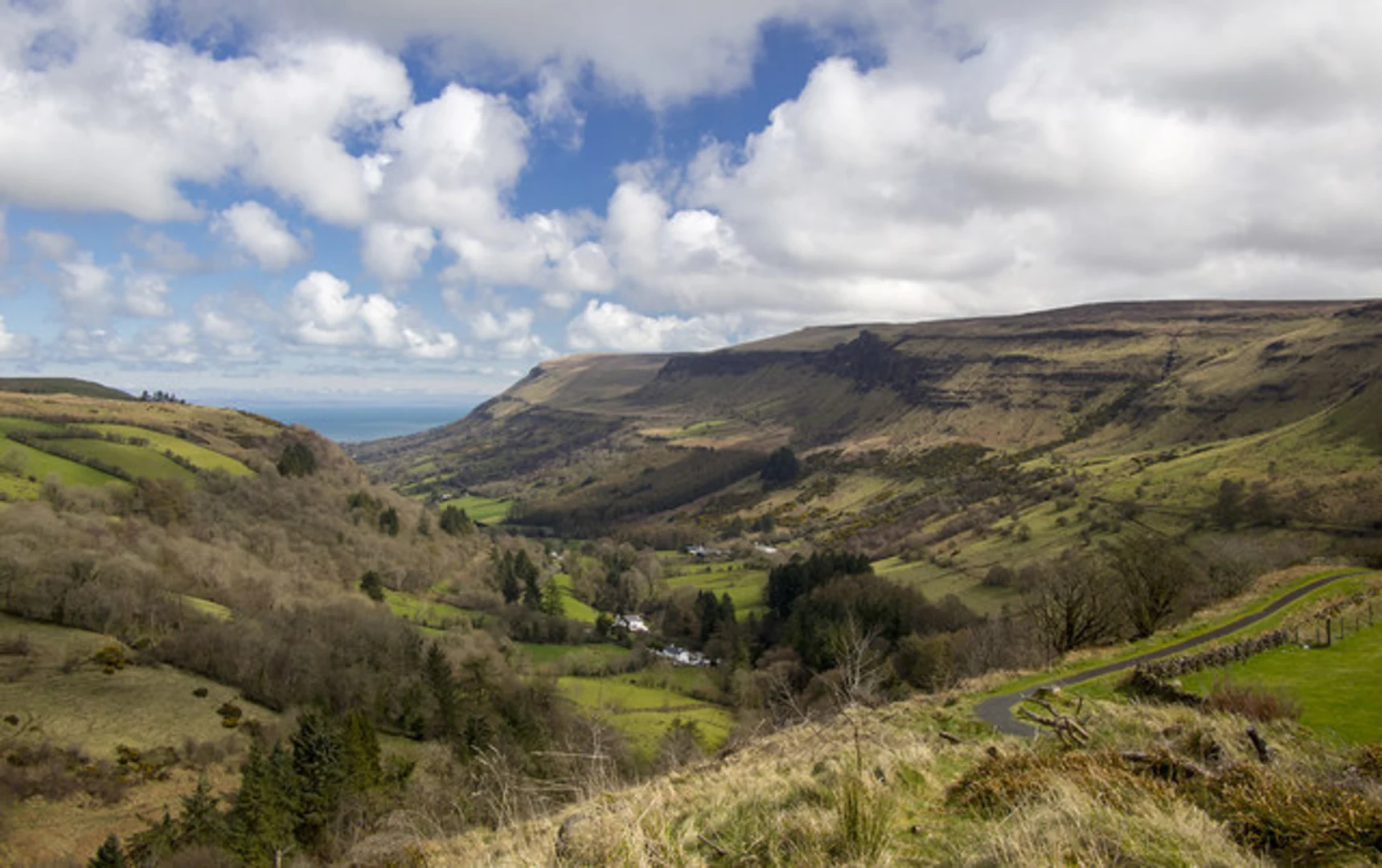 An image depicting the trail Glenariff Forest Park and its surrounding area.